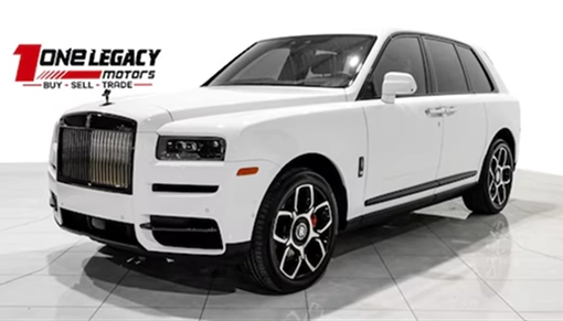 White 2022 Rolls-Royce Cullinan photographed on the One Legacy Motors showroom floor