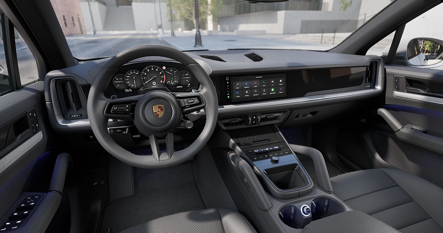 Porsche Cayenne cockpit with its curved digital gauge cluster and widescreen centre display