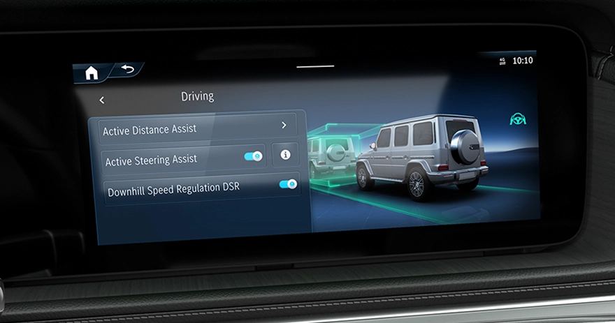 Mercedes-Benz centre display showing the Driving menu with Active Distance Assist and Active Steering Assist