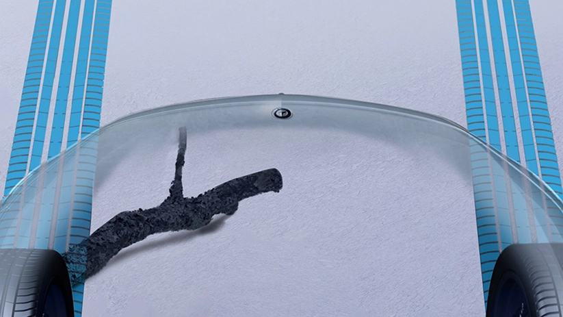 Transparent-bonnet camera view showing a rocky track under the front of a Mercedes-Benz