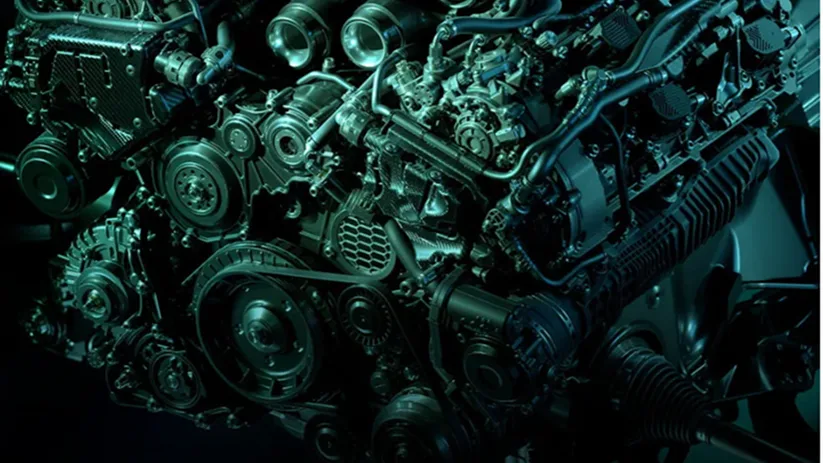 Close-up render of an Aston Martin twin-turbo V8 in dark green tones