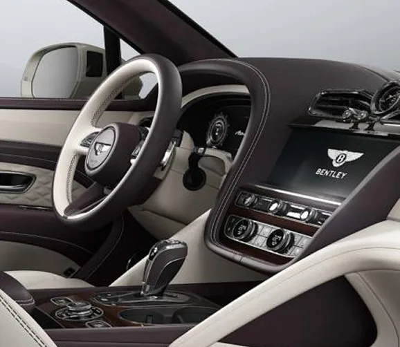 Bentley cabin seen through the open roof, with cream leather seats