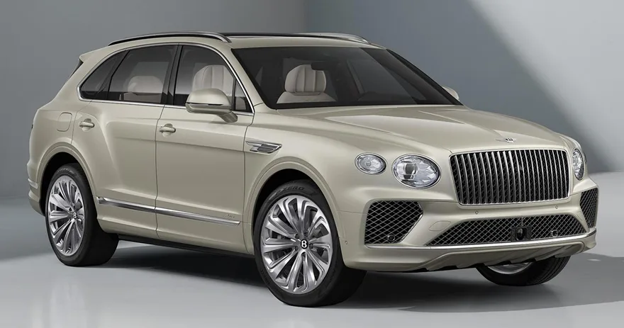 Cream Bentley Bentayga Azure photographed in a pale studio