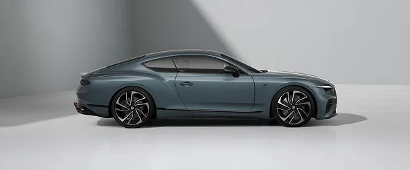 Dark teal Bentley Continental GT in profile