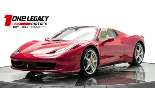 Red 2014 Ferrari 458 Spider with its roof down, photographed on the One Legacy Motors turntable