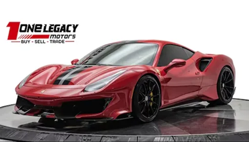 Red 2019 Ferrari 488 Pista with white and blue racing stripes, photographed on the One Legacy Motors turntable