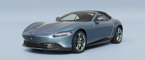 Front three-quarter studio view of a silver-blue Ferrari Roma Spider with the roof up