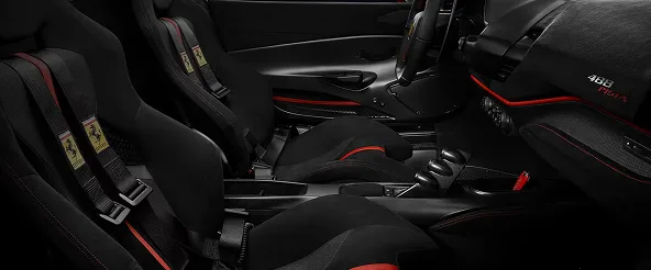 Ferrari 488 Pista interior with lightweight carbon racing seats and red accent stitching