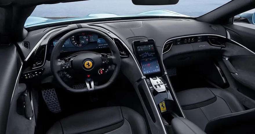 Ferrari Roma Spider dual-cockpit dashboard with the central touchscreen and digital cluster lit up