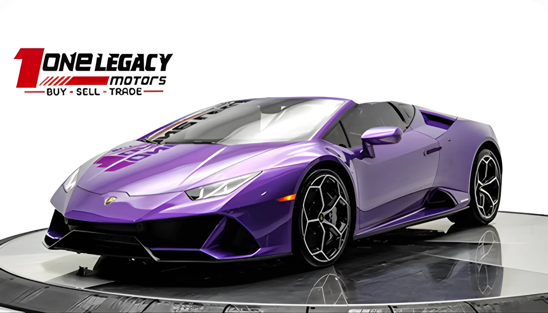 Purple 2024 Lamborghini Huracan EVO Spyder with the roof down on the One Legacy Motors turntable