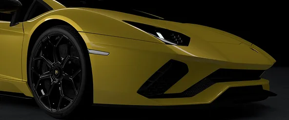 Front detail of a yellow Lamborghini Aventador showing its angular splitter