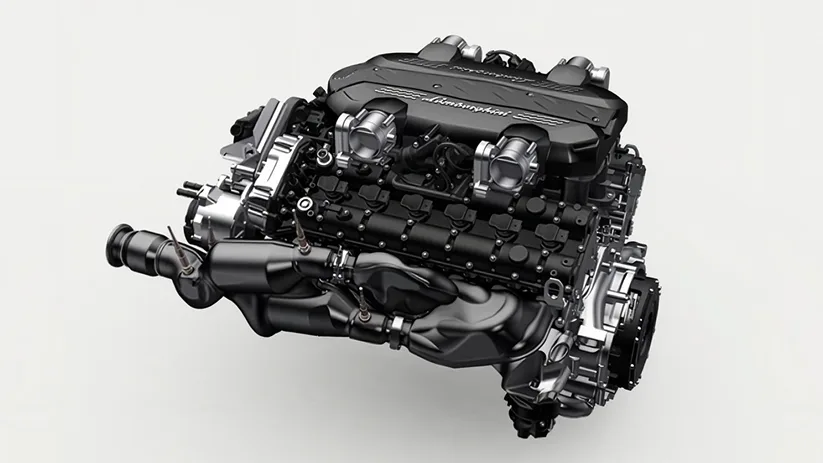 Lamborghini V12 engine and gearbox assembly on a plain studio background