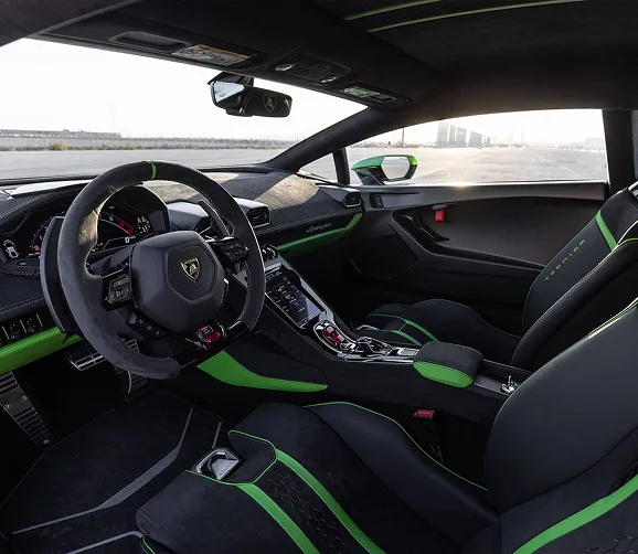 Lamborghini Huracan interior with green contrast stitching and hexagonal trim