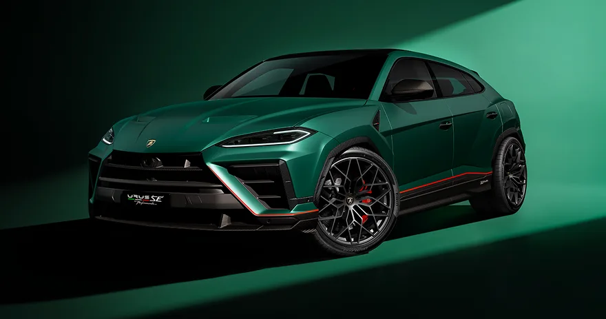 Dark green Lamborghini Urus photographed against a green studio backdrop