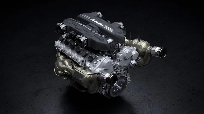 Lamborghini Revuelto V12 engine on a dark studio background